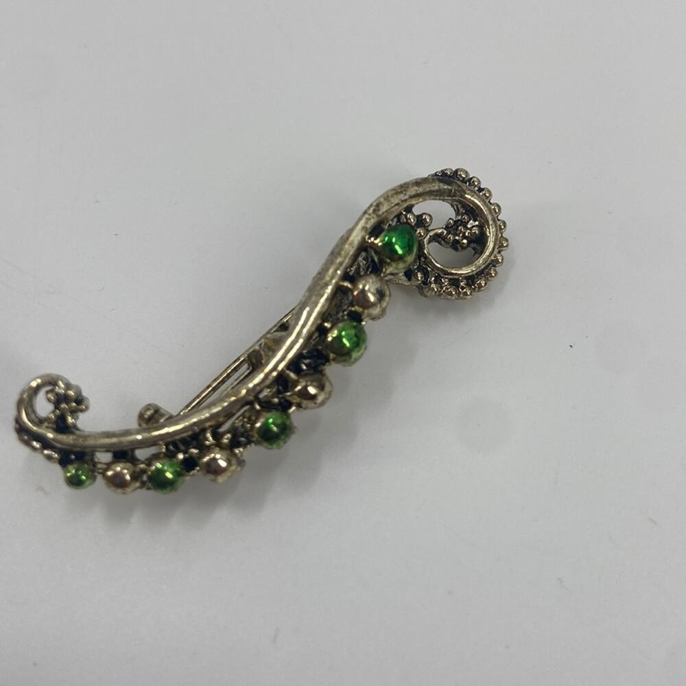 Goldtone green brooch